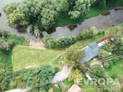 Rozlehlý stavební pozemek s restaurací na břehu řeky, cena cena v RK, nabízí 